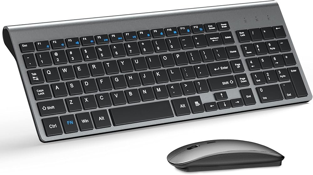 TopMate ultra-slim gold and black wireless keyboard and mouse set on a styled gold desk
